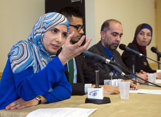 Vice-president of the Canadian Muslim Forum, Kathy Malas, speaks to reporters as Sameer Zuberi, Samer Majzoub, and Samah Jabbar look on at a news conference in Montreal on Friday, February 20, 2015